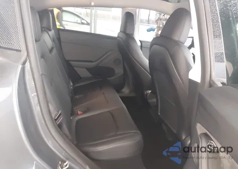 2023 Tesla Model Y Awd/Long Range Dual Motor All-Wheel Drive z USA, uszkodzony, nr VIN 7SAYGDEE3PA140727